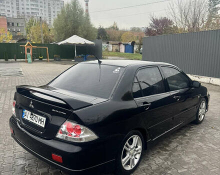 Чорний Міцубісі Lancer, об'ємом двигуна 2 л та пробігом 210 тис. км за 5500 $, фото 8 на Automoto.ua