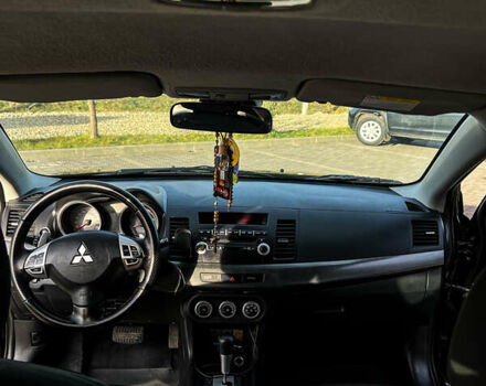 Черный Мицубиси Лансер, объемом двигателя 2 л и пробегом 333 тыс. км за 7300 $, фото 8 на Automoto.ua