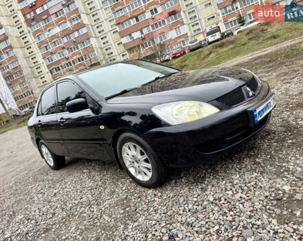 Черный Мицубиси Лансер, объемом двигателя 1.6 л и пробегом 216 тыс. км за 4990 $, фото 6 на Automoto.ua