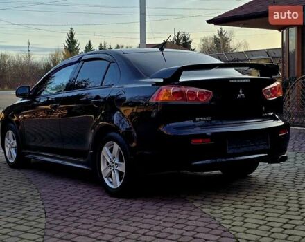 Чорний Міцубісі Lancer, об'ємом двигуна 2 л та пробігом 260 тис. км за 6555 $, фото 9 на Automoto.ua