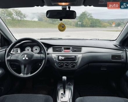 Чорний Міцубісі Lancer, об'ємом двигуна 1.6 л та пробігом 243 тис. км за 4950 $, фото 47 на Automoto.ua