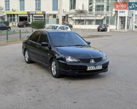 Чорний Міцубісі Lancer, об'ємом двигуна 2 л та пробігом 152 тис. км за 5500 $, фото 6 на Automoto.ua
