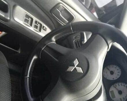 Черный Мицубиси Лансер, объемом двигателя 1.6 л и пробегом 223 тыс. км за 4300 $, фото 1 на Automoto.ua