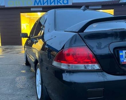 Черный Мицубиси Лансер, объемом двигателя 1.6 л и пробегом 249 тыс. км за 5000 $, фото 8 на Automoto.ua