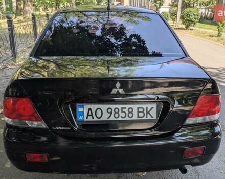 Чорний Міцубісі Lancer, об'ємом двигуна 1.6 л та пробігом 366 тис. км за 3500 $, фото 11 на Automoto.ua
