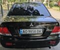 Чорний Міцубісі Lancer, об'ємом двигуна 1.6 л та пробігом 366 тис. км за 3500 $, фото 11 на Automoto.ua