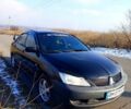 Черный Мицубиси Лансер, объемом двигателя 1.6 л и пробегом 300 тыс. км за 3700 $, фото 5 на Automoto.ua