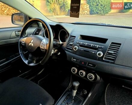 Чорний Міцубісі Lancer, об'ємом двигуна 2 л та пробігом 260 тис. км за 6555 $, фото 32 на Automoto.ua