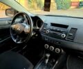 Черный Мицубиси Лансер, объемом двигателя 2 л и пробегом 260 тыс. км за 6555 $, фото 32 на Automoto.ua