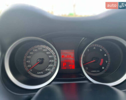 Черный Мицубиси Лансер, объемом двигателя 2 л и пробегом 193 тыс. км за 7500 $, фото 11 на Automoto.ua