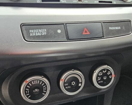 Черный Мицубиси Лансер, объемом двигателя 2 л и пробегом 115 тыс. км за 5000 $, фото 22 на Automoto.ua