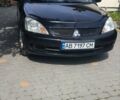 Чорний Міцубісі Lancer, об'ємом двигуна 1.58 л та пробігом 220 тис. км за 4200 $, фото 1 на Automoto.ua