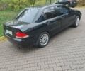 Чорний Міцубісі Lancer, об'ємом двигуна 1.58 л та пробігом 190 тис. км за 3750 $, фото 21 на Automoto.ua