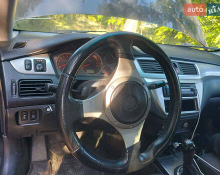 Чорний Міцубісі Lancer, об'ємом двигуна 2 л та пробігом 290 тис. км за 3300 $, фото 8 на Automoto.ua