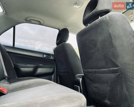 Чорний Міцубісі Lancer, об'ємом двигуна 1.6 л та пробігом 243 тис. км за 4950 $, фото 46 на Automoto.ua