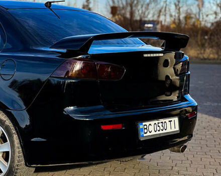 Черный Мицубиси Лансер, объемом двигателя 2 л и пробегом 333 тыс. км за 7300 $, фото 3 на Automoto.ua