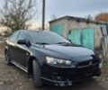 Черный Мицубиси Лансер, объемом двигателя 2 л и пробегом 170 тыс. км за 7000 $, фото 1 на Automoto.ua