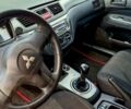 Черный Мицубиси Лансер, объемом двигателя 1.58 л и пробегом 260 тыс. км за 3900 $, фото 1 на Automoto.ua
