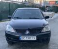 Чорний Міцубісі Lancer, об'ємом двигуна 1.6 л та пробігом 240 тис. км за 3850 $, фото 1 на Automoto.ua