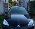 Мицубиси Лансер 2007 в Кременчуге на Automoto.ua Черный Мицубиси Лансер, объемом двигателя 1.6 л и пробегом 230 тыс. км за 4000 $, фото 1 на Automoto.ua