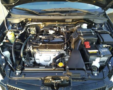 Черный Мицубиси Лансер, объемом двигателя 1.6 л и пробегом 32 тыс. км за 9000 $, фото 18 на Automoto.ua