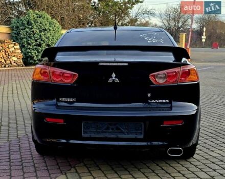 Чорний Міцубісі Lancer, об'ємом двигуна 2 л та пробігом 260 тис. км за 6555 $, фото 6 на Automoto.ua