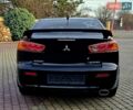 Чорний Міцубісі Lancer, об'ємом двигуна 2 л та пробігом 260 тис. км за 6555 $, фото 6 на Automoto.ua