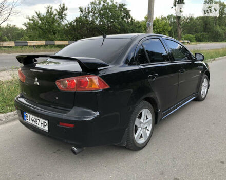 Чорний Міцубісі Lancer, об'ємом двигуна 2 л та пробігом 185 тис. км за 6950 $, фото 2 на Automoto.ua