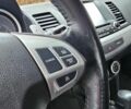 Черный Мицубиси Лансер, объемом двигателя 2 л и пробегом 115 тыс. км за 5000 $, фото 21 на Automoto.ua