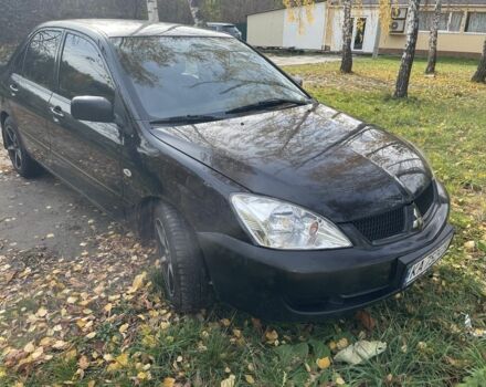 Міцубісі Lancer 2007 у Каневе на Automoto.ua Чорний Міцубісі Lancer, об'ємом двигуна 1.6 л та пробігом 310 тис. км за 4100 $, фото 7 на Automoto.ua