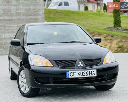 Чорний Міцубісі Lancer, об'ємом двигуна 1.6 л та пробігом 243 тис. км за 4950 $, фото 18 на Automoto.ua