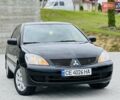 Чорний Міцубісі Lancer, об'ємом двигуна 1.6 л та пробігом 243 тис. км за 4950 $, фото 18 на Automoto.ua