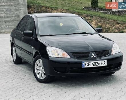 Чорний Міцубісі Lancer, об'ємом двигуна 1.6 л та пробігом 243 тис. км за 4950 $, фото 19 на Automoto.ua