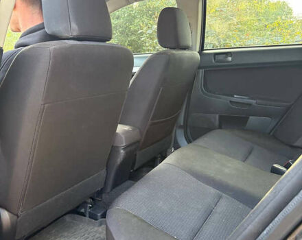 Черный Мицубиси Лансер, объемом двигателя 1.5 л и пробегом 111 тыс. км за 7500 $, фото 14 на Automoto.ua