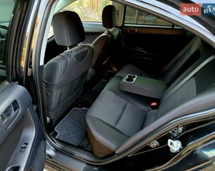 Черный Мицубиси Лансер, объемом двигателя 2 л и пробегом 260 тыс. км за 6555 $, фото 28 на Automoto.ua