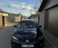 Черный Мицубиси Лансер, объемом двигателя 2 л и пробегом 220 тыс. км за 5250 $, фото 4 на Automoto.ua