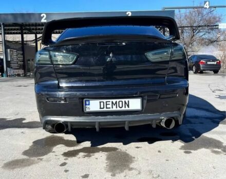 Чорний Міцубісі Lancer, об'ємом двигуна 2 л та пробігом 226 тис. км за 6700 $, фото 3 на Automoto.ua