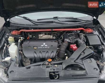 Черный Мицубиси Лансер, объемом двигателя 2 л и пробегом 116 тыс. км за 7200 $, фото 11 на Automoto.ua