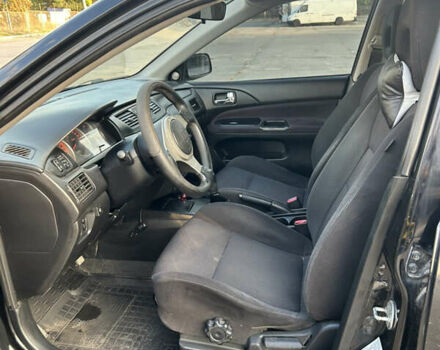 Чорний Міцубісі Lancer, об'ємом двигуна 2 л та пробігом 280 тис. км за 4600 $, фото 39 на Automoto.ua