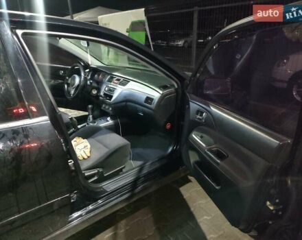 Чорний Міцубісі Lancer, об'ємом двигуна 2 л та пробігом 145 тис. км за 5000 $, фото 9 на Automoto.ua