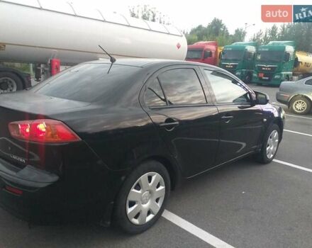 Черный Мицубиси Лансер, объемом двигателя 1.5 л и пробегом 270 тыс. км за 4500 $, фото 2 на Automoto.ua