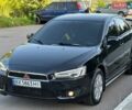 Чорний Міцубісі Lancer, об'ємом двигуна 2 л та пробігом 225 тис. км за 6500 $, фото 1 на Automoto.ua