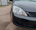 Чорний Міцубісі Lancer, об'ємом двигуна 1.6 л та пробігом 273 тис. км за 3999 $, фото 10 на Automoto.ua