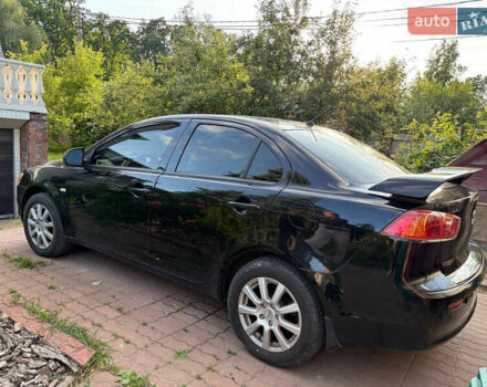 Черный Мицубиси Лансер, объемом двигателя 1.5 л и пробегом 111 тыс. км за 7500 $, фото 18 на Automoto.ua