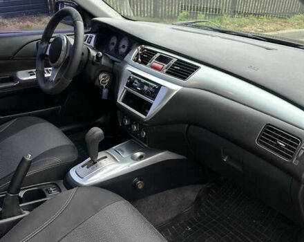 Черный Мицубиси Лансер, объемом двигателя 2 л и пробегом 260 тыс. км за 5300 $, фото 9 на Automoto.ua