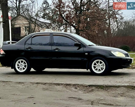 Чорний Міцубісі Lancer, об'ємом двигуна 1.6 л та пробігом 303 тис. км за 4350 $, фото 2 на Automoto.ua