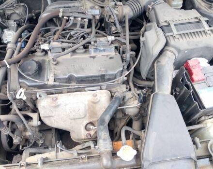 Чорний Міцубісі Lancer, об'ємом двигуна 1.6 л та пробігом 255 тис. км за 5000 $, фото 4 на Automoto.ua