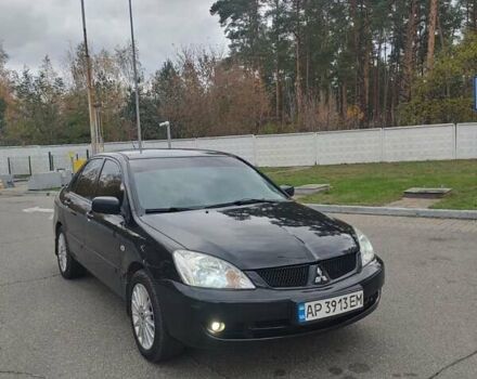 Чорний Міцубісі Lancer, об'ємом двигуна 1.58 л та пробігом 190 тис. км за 3750 $, фото 10 на Automoto.ua