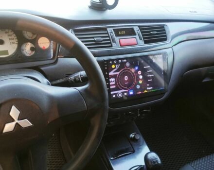 Чорний Міцубісі Lancer, об'ємом двигуна 1.6 л та пробігом 221 тис. км за 4600 $, фото 1 на Automoto.ua