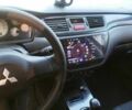Чорний Міцубісі Lancer, об'ємом двигуна 1.6 л та пробігом 221 тис. км за 4600 $, фото 1 на Automoto.ua